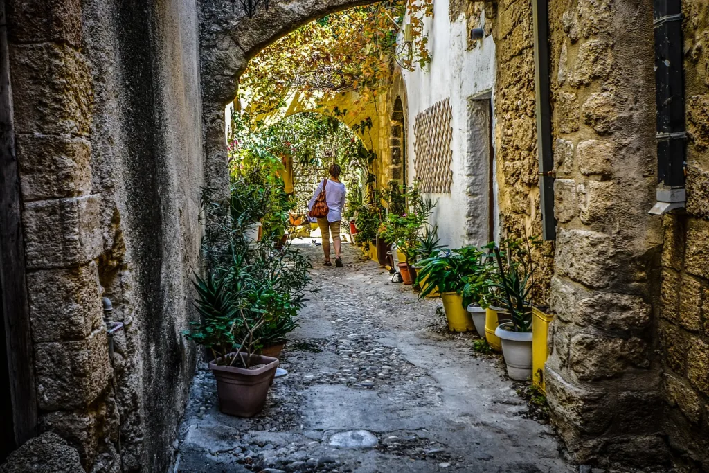solo, traveler, female, woman, walk, travel, pet, alley, cat, feline, stray, kitties, vacation, lonely, tourism, tourist, walking, young, girl, animal, adventure, traveller, journey, greece, mediterranean, rhodes, island, shade, old, stone, trip from article Gen Z Solo Retreats in California