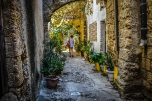solo, traveler, female, woman, walk, travel, pet, alley, cat, feline, stray, kitties, vacation, lonely, tourism, tourist, walking, young, girl, animal, adventure, traveller, journey, greece, mediterranean, rhodes, island, shade, old, stone, trip from article Gen Z Solo Retreats in California