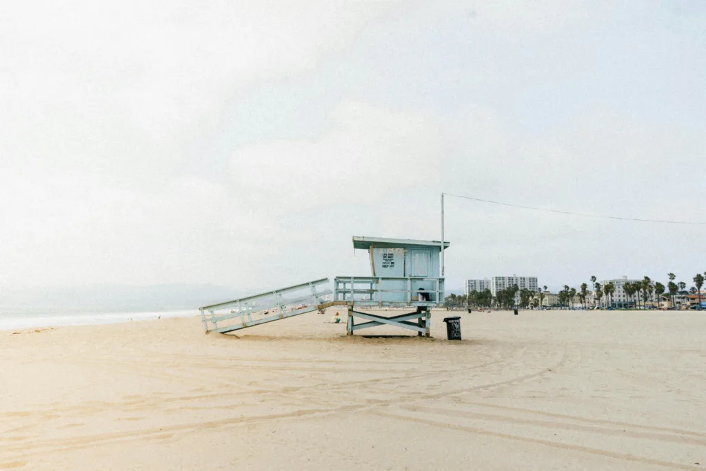 Scenic view of a lifeguard tower on the sandy beach of Santa Monica, Los Angeles from California Spa Guide